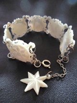 光を集めてまたたく ベツレヘムパール　美しい透かし彫りのブレスレット　星のモチーフ